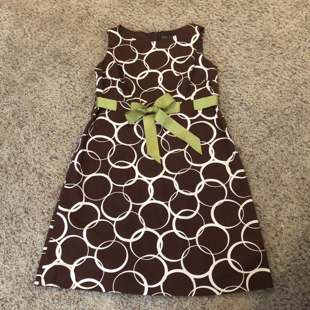 Sleeveless, a lined midi.